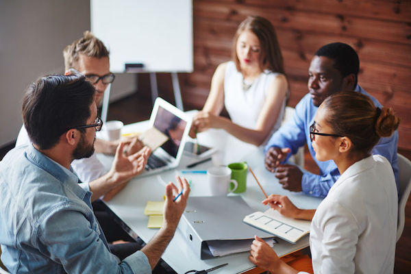 42923695 - group of multi-ethnic business partners discussing ideas