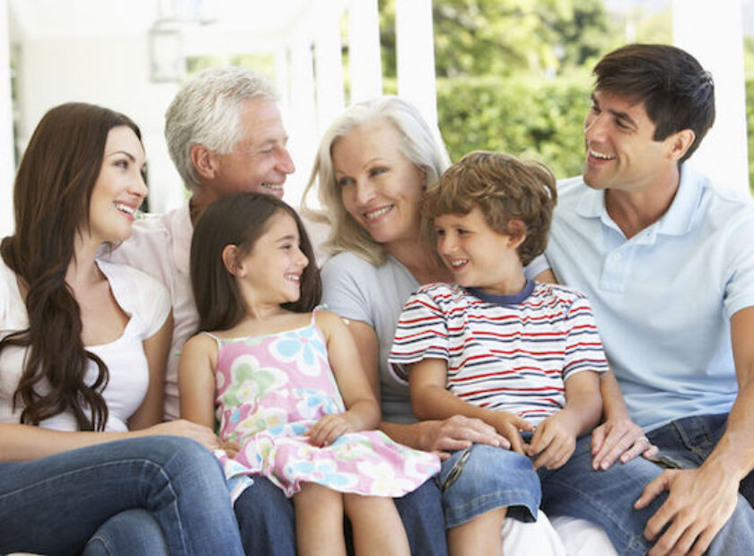 42396667 - extendend family sitting in garden